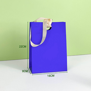 Hot Selling Greaseproof Brown Kraft Wedding Candy Packaging Handbag Die-Cut Handles Ribbon Luxurious Eco-Friendly Craft Bag - Product Image 4