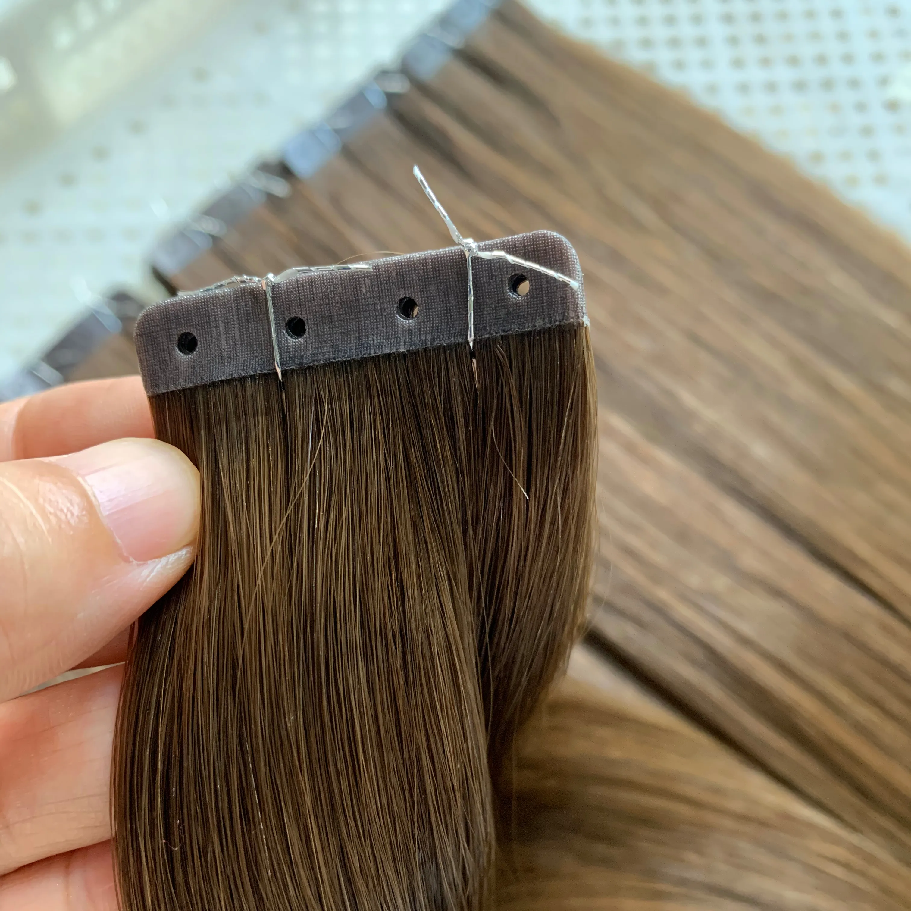 نمط جديد! أعلى جودة حفرة لكمات الشريط في شعر مستعار بشري الجلد لحمة الغراء أقل الشريط في الروسية الشعر