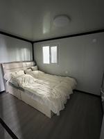 Maison préfabriquée modulaire de luxe extensible, pliable et mobile avec un design moderne et une garantie d'un an pour l'habitation