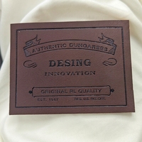 Étiquettes en cuir personnalisées d'usine, en rouleau, multi-matériaux et couleurs, sur mesure pour vêtements et sacs de marques de luxe