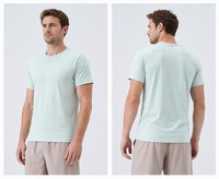 T-shirts de sport athlétiques pour hommes, col rond, haute qualité, design OEM personnalisé, coupe ajustée, séchage rapide, respirant, extensible, pour la course à pied et l'entraînement