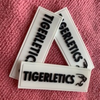 Étiquette en caoutchouc en plastique souple avec logo de tigre de 2mm d'épaisseur, patch en caoutchouc PVC personnalisé en gros pour vêtement