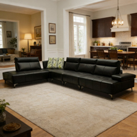 Canapé d'angle convertible contemporain en cuir véritable avec rembourrage en mousse, idéal pour des moments de détente confortables et les grandes réunions de famille