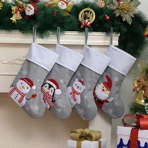 Chaussettes de Noël brodées monogramme pingouin, grand renne, bonhomme de neige gris pour décoration suspendue à l'arbre - Product Image 1