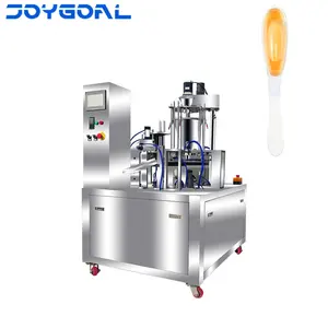 Shanghai Joygoal automatic rotary blister cup filling and sealing machine for honey packing equipment high quality