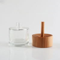 Vente en gros de flacons de parfum/désodorisant en verre de 60 ml avec bouchon à vis en bois et impression sérigraphique