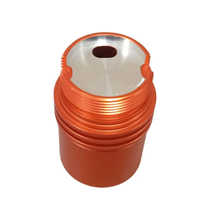 Carcasa cilíndrica roscada de aluminio anodizado naranja, mecanizada por CNC a medida, con ranura superior tubular para piezas de equipos de motocicleta - Product Image 1