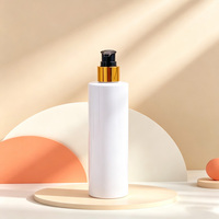 Flacon à pression plat transparent en PET 100ml 120ml 150ml 200ml 250ml 300ml 400ml 500ml avec pompe dorée pour lotion et shampoing
