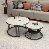 Ensemble de tables basses rondes modernes de luxe, table centrale imbriquée avec plateau en pierre frittée et structure métallique pour salon et hôtel