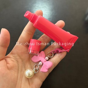 ISMAN Venta al por mayor Tubo de brillo labial exprimible de 15ml con orificio para llavero, envase vacío para esencia labial en tonos marrón y rosa, para colgante de lazo y cuentas - Product Image 5
