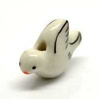 L'usine vend des conceptions personnalisées peintes à la main colombe de la paix perles animales en porcelaine pour la fabrication de bijoux pour enfants et cadeau touristique