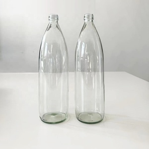 Botellas de <span class=keywords><strong>vidrio</strong></span> de jugo y <span class=keywords><strong>agua</strong></span> de manantial <span class=keywords><strong>mineral</strong></span> ligera de 1000ml con tapón de rosca ROPP - Product Image 1
