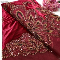 Tissu en dentelle brodé de perles et de paillettes, prix usine Chine, collection 2026, idéal pour mariages et célébrations