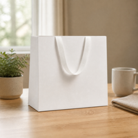Sacs en papier blancs avec logo personnalisé pour le shopping, emballage de cadeaux de luxe, sacs en papier pour vêtements avec poignée
