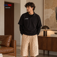 Polo à manches courtes noir pour homme, coupe oversize et carrée, style streetwear vintage, décontracté, uni, avec logo personnalisé