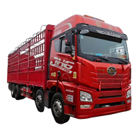 Camion de fret diesel Shacman d'occasion 30 tonnes 8x4, transmission manuelle, >450 ch, norme Euro 5, réservoir de chargement à gauche, clôture, caméra arrière