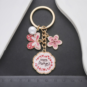 <span class=keywords><strong>Mejor</strong></span> Día DE LA MADRE Regalo de cumpleaños único Pink Mom Llavero Pearl Heart Butterfly Flower Charms Car Bag Backbag Keyring Made Metal - Product Image 4