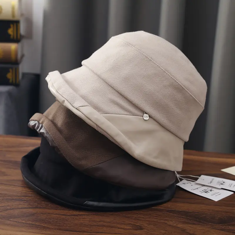 Nuovo stile semplice cappello pieghevole da donna autunno e inverno pelle arrotolata orlo cappello da pescatore Versatile secchiello