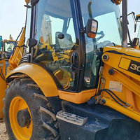 Chargeuse-pelleteuse d'occasion JK-JCB3CX avec godet de 0,84 m³ et godet de 1 m³ pour projets de construction
