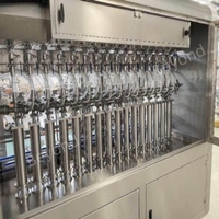 Machine de remplissage automatique à piston linéaire pour liquides visqueux - Équipement d'embouteillage de haute précision