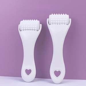 Rouleau de massage facial en silicone, outil de lifting du visage, soin de la peau, masseur Gua Sha pour spa, salon, cadeaux promotionnels - Product Image 1