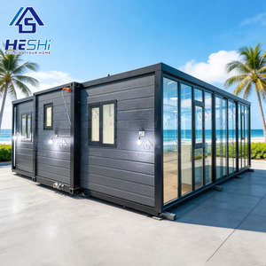 บ้านคอนเทนเนอร์สำเร็จรูป HESHi รุ่นโมเดิร์น รูปทรงสี่เหลี่ยมผืนผ้า  ตกแต่งจากตู้คอนเทนเนอร์ขนส่งสินค้า พร้อมผนังกระจก สำหรับใช้งานกลางแจ้ง - Product Image 1
