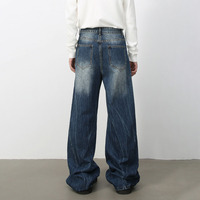 Jean large pour homme, coupe ample et décontractée, finition déchirée, cinq poches, fermeture boutonnée, passants de ceinture, longueur intégrale, pantalon en denim streetwear