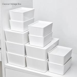 white plastic storage box with lid