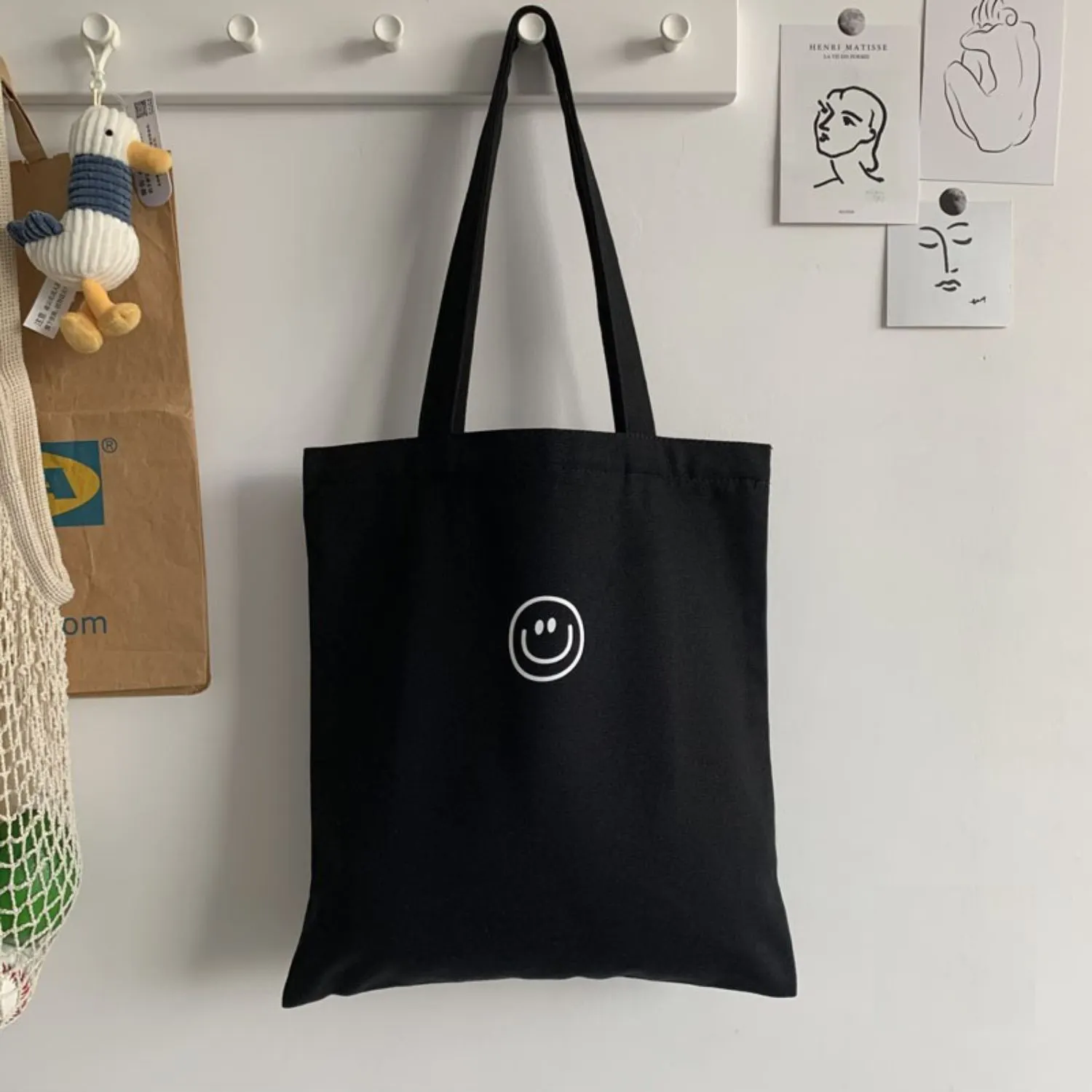 Venta al por mayor de 34x37cm logotipo personalizado de impresión de alta calidad 12oz negro/beige 100% algodón bolsa de lona con cremallera y bolsillo