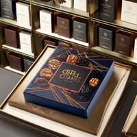 Vente en gros d'emballages cadeaux en chocolat pour aliments pour bébés personnalisés boîtes de plateau à palettes en carton enduit gaufrage stratification mate pour noix