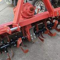 Fraise rotative agricole à lame épaissie pour tracteur, avec rouleau à dents de loup intégré pour la préparation des sols de rizière et de terres arides