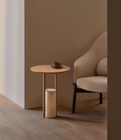 Table basse ronde de style italien moderne avec base en travertin pour appartement ou bureau