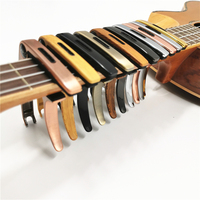Accessoire d'instrument de musique de Capo de guitare acoustique coloré direct d'usine pour le prix d'ukulélé