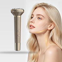 Bâton de massage facial et du cou à rotation automatique gauche-droite, têtes en silicone remplaçables, rouleau facial, masseur facial, vente en gros