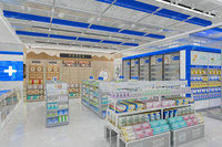 01-XDKJS-A Conception de pharmacie moderne avec système d'étagères et présentoirs en îlot au thème bleu pour les magasins de détail