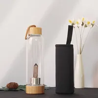 Bouteille d'eau en verre cristal de luxe 17 oz, anti-fuite, sans BPA, style européen, réutilisable, avec couvercle et manchon en bambou de qualité alimentaire, vente en gros