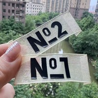 Étiquettes transparentes en organza 3D en silicone, tendance, faible MOQ, impressions graphiques personnalisées pour vêtements de sport et t-shirts streetwear de marques de mode