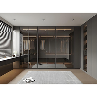 Armoire de chambre moderne sur mesure avec cadre en aluminium, porte vitrée, éclairage LED et dressing intégré avec coiffeuse