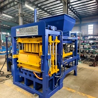 Machine de production de blocs de béton QT4-15B pour la fabrication de briques creuses