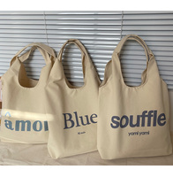 Sacs à provisions en coton recyclé imprimé avec logo personnalisé de style Ins Gilet t-shirt tissé certifié GRS BSCI Promotion de nouveaux produits réutilisables