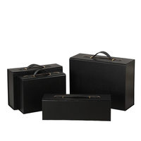 Maßgefertigte Starre Geschenkbox mit Griff Robuste Karton-Schuhtasche Verpackung für Socken Fell Großhandel Logo-Druck Geschenk
