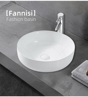 Lavabo rond en céramique de porcelaine blanche à poser sur comptoir pour salle de bain, design artistique