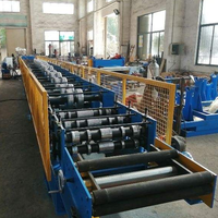 Machine de formage à froid pour tuyaux de descente de pluie en acier galvanisé PPGI de 0,3 à 0,8 mm pour système de drainage des eaux pluviales de toiture