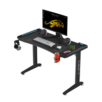 Bureau de jeu ergonomique en bois en forme de Z Wquantum Cool avec porte-gobelet, crochet pour casque, surface en mélamine, assemblage requis, modèle Z10
