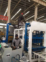 Machine de fabrication de briques de ciment à emboîter Ligne de production efficace avec moteur central et composants PLC
