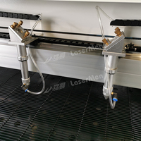 Machine de découpe laser CO2 à alimentation automatique 1800x2500mm pour textiles, outil pour motifs personnalisés, vêtements et traitement rapide d'uniformes