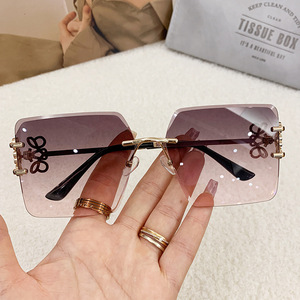 Fashion Frameless <b>Oversized</b> <b>Sunglasses</b> Gold Metal Bow Polygonal Design Women UV400 Light Weight - Product Image 2