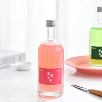 Op maat gemaakte glazen fruitwijnfles van 100ml en 500ml met kurkverzegeling, OEM-logo, lege fles voor pruimenwijnbereiding