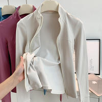Veste de sport haut de gamme pour femme à col montant et manches longues, coupe-vent, pour le yoga, la course et l'entraînement