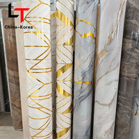 Mármol metálico Película de PVC dorado Película de decoración de transferencia de calor Rollo de estampado en caliente para fabricante de láminas de prensa al vacío Laminación dorada